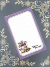 Notepad with floral design and text on a decorative background