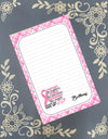 Personalized breast cancer awareness notepad featuring an elegant pink ribbon design with a custom name on a decorative gray background