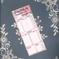 Personalized custom magnetic baby daily log notepad with baby name, tracking feedings and sleep, mounted on a clean refrigerator.